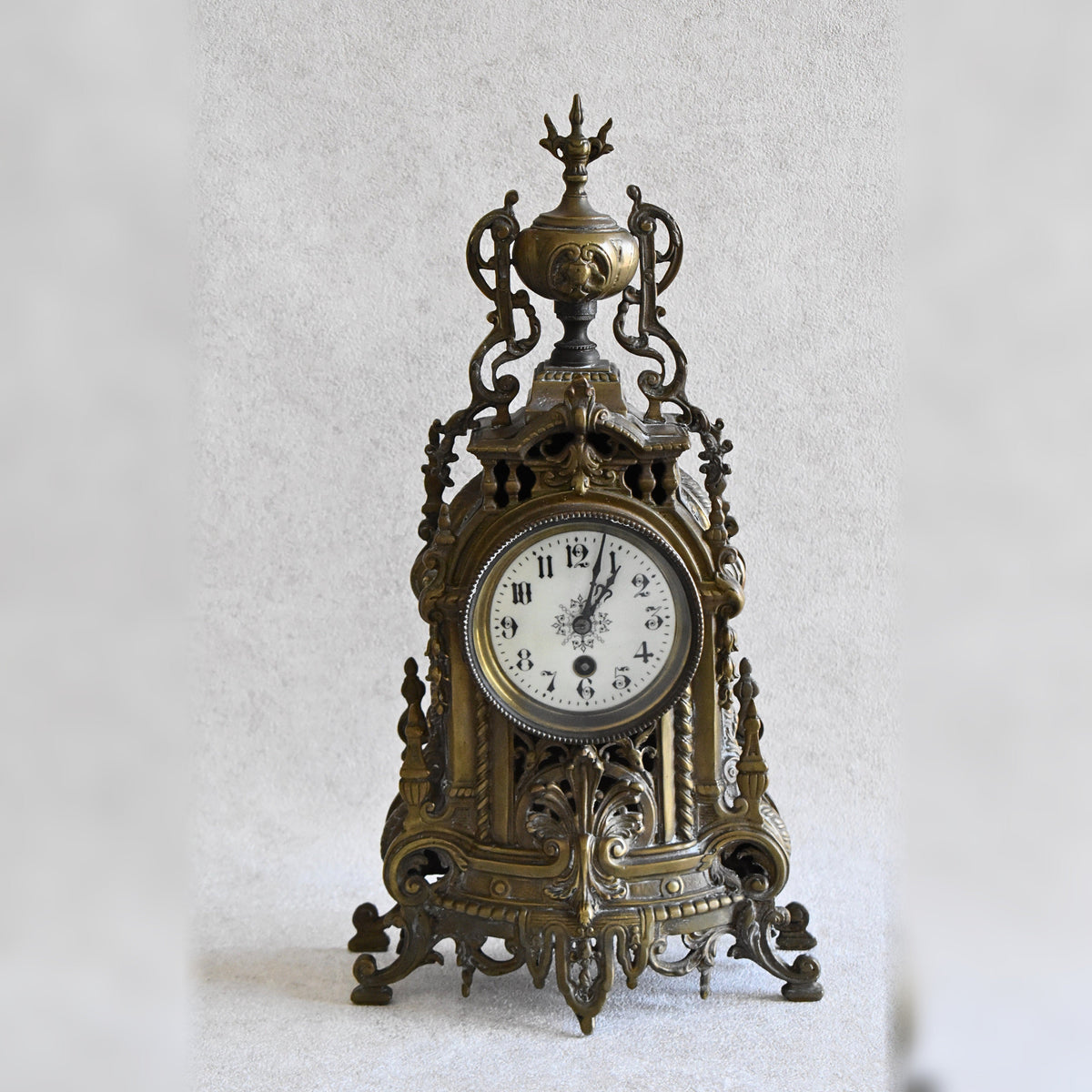 Ornate antique brass mantel clock