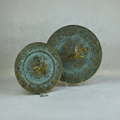 Pair of Embossed Brass Hunting Scene Wall Plates