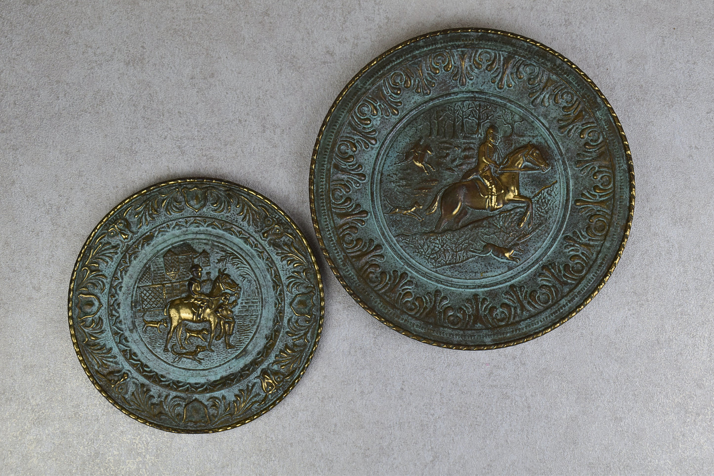 Pair of Embossed Brass Hunting Scene Wall Plates