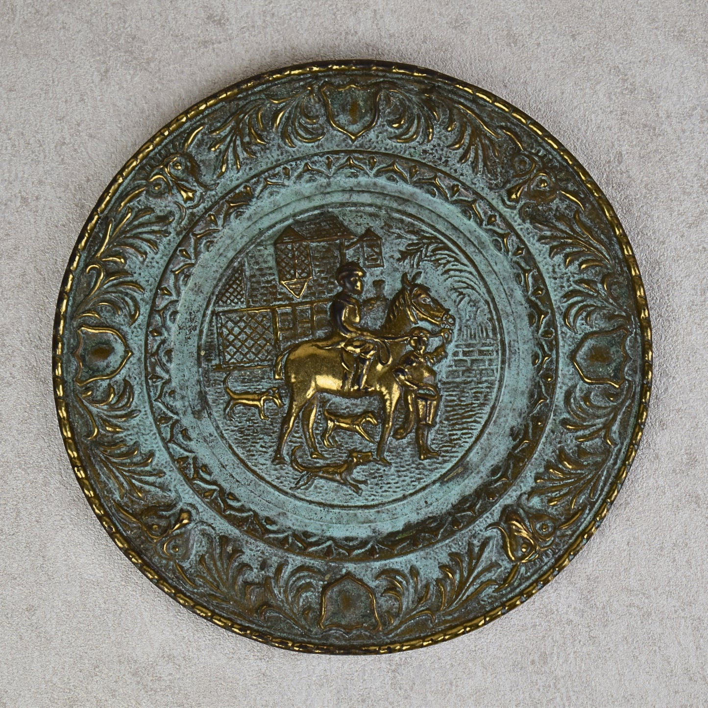 Pair of Embossed Brass Hunting Scene Wall Plates