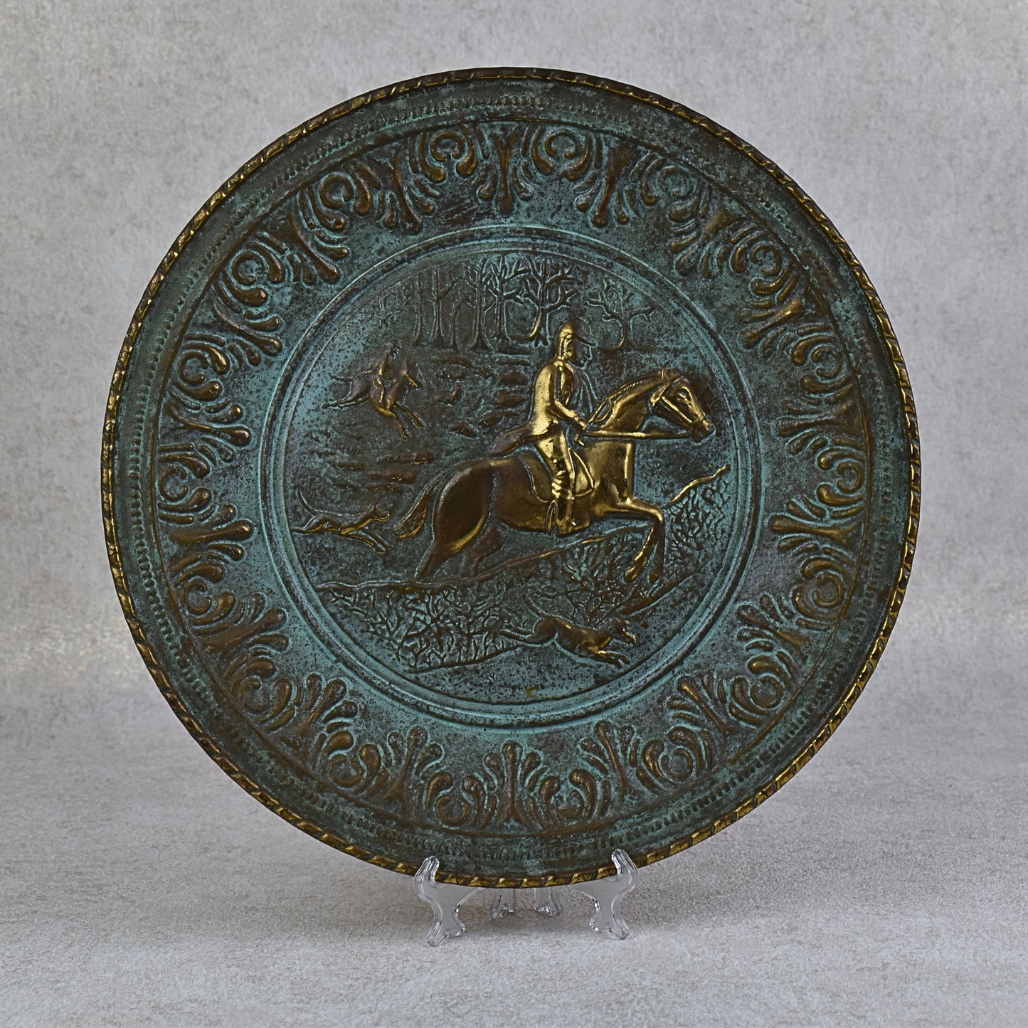 Pair of Embossed Brass Hunting Scene Wall Plates